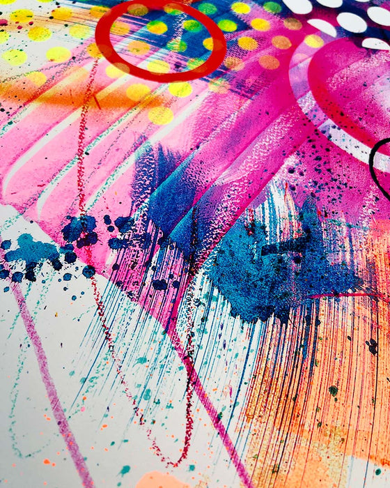 Close-up of details and textures of a  vibrant abstract artwork by artist Kate Elkington, bursting with neon hues of pink, orange, yellow, and blue. The composition features bold circular shapes, polka dot patterns, energetic paint splatters, and expressive brushstrokes. Layered textures add contrast and depth, creating a dynamic piece full of playful movement and joyful energy.