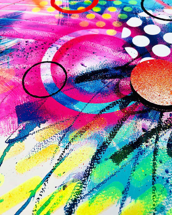 Close-up of details and textures of a  vibrant abstract artwork by artist Kate Elkington, bursting with neon hues of pink, orange, yellow, and blue. The composition features bold circular shapes, polka dot patterns, energetic paint splatters, and expressive brushstrokes. Layered textures add contrast and depth, creating a dynamic piece full of playful movement and joyful energy.