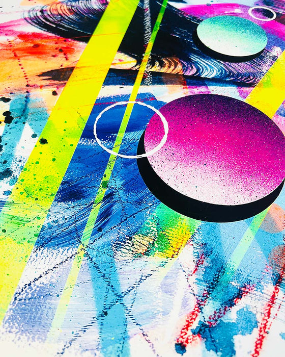 Close-up of details and textures of a vibrant abstract artwork by Kate Elkington bursting with neon hues of pink, orange, yellow, and blue. The composition features bold circular shapes, polka dot patterns, stripes, energetic paint splatters, and expressive brushstrokes. Layered textures add contrast and depth, creating a dynamic piece full of playful movement and joyful energy.