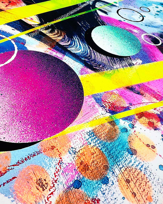 Close-up of details and textures of a vibrant abstract artwork by Kate Elkington bursting with neon hues of pink, orange, yellow, and blue. The composition features bold circular shapes, polka dot patterns, stripes, energetic paint splatters, and expressive brushstrokes. Layered textures add contrast and depth, creating a dynamic piece full of playful movement and joyful energy.