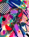 Close-up of details and textures of colourful abstract fine art print by Kate Elkington filled with vibrant hues of neon pink, blue, orange, and yellow. The composition features layered circular shapes, bold polka dots, and geometric patterns such as triangles and grids. Energetic brushstrokes and splashes of paint create a lively, dynamic effect, while contrasting tones of black and white add balance. The piece exudes a playful and uplifting vibe.